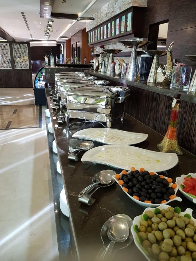 Thwary Hotel Suites Riadh Exterior foto